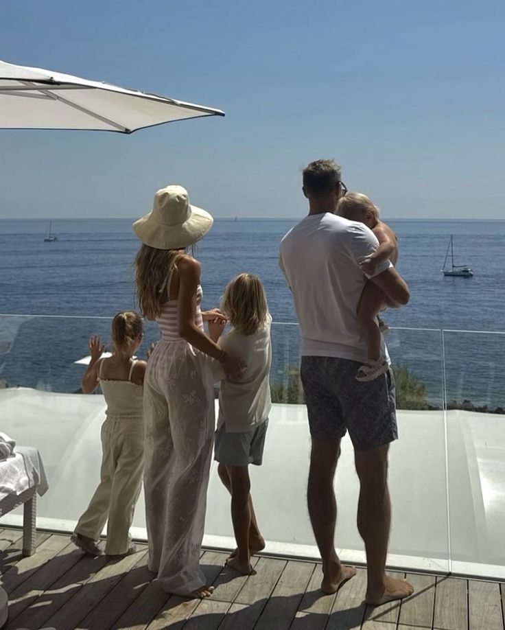 A family walking down to a quiet cove